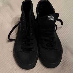 Vans Women’s Black High-Top Sneakers